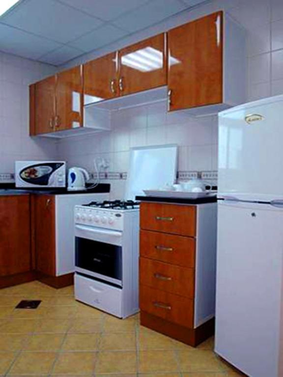 Arcadia Hotel Suites Sharjah Habitación foto